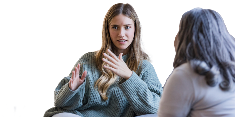 Girl talking to mental health professional