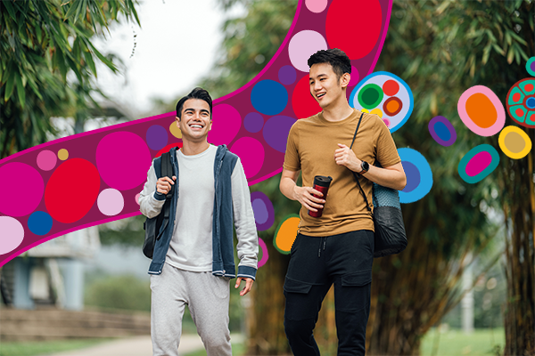 Two men walking and talking 