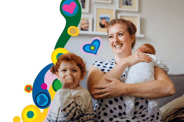 Mother and children sitting on couch