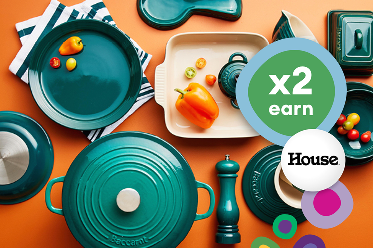 Woman smiling surrounded by various Live Better rewards partners