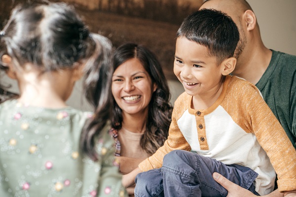 Hispanic Family laughing together