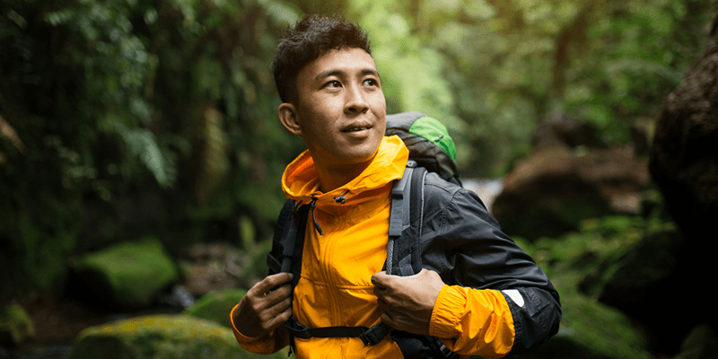 Man exploring a rainforest